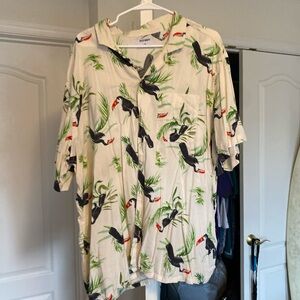 A Hawaiian shirt with a bird pattern.